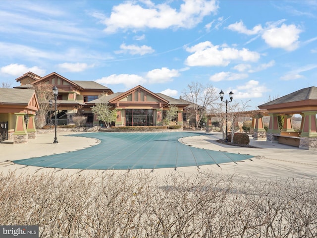 view of swimming pool with a gazebo and a patio area