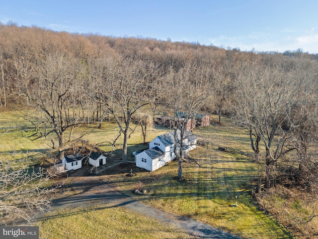 birds eye view of property with a rural view