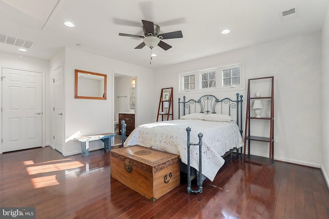 bedroom featuring ceiling fan and dark hardwood / wood-style floors