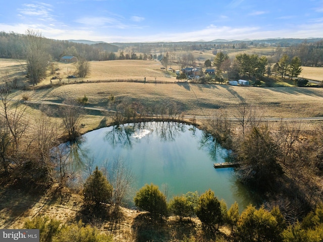 aerial view with a water view and a rural view