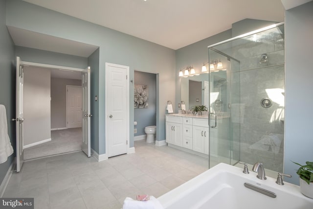 full bath with a stall shower, toilet, vanity, and baseboards