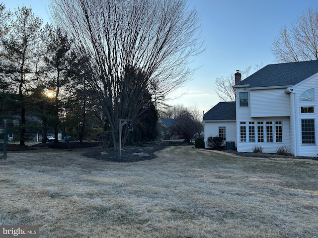 view of yard featuring central AC unit