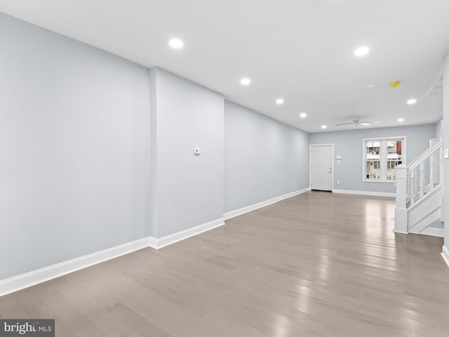 interior space featuring ceiling fan and light wood-type flooring