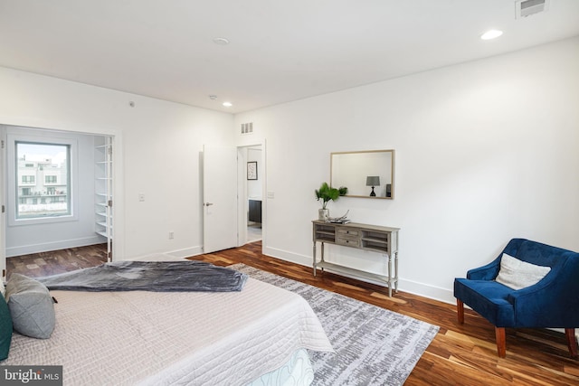 bedroom featuring hardwood / wood-style floors