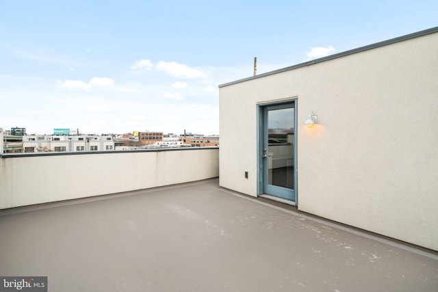 view of patio with a balcony