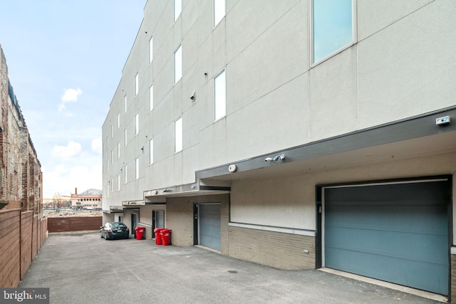 exterior space with a garage