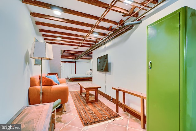 interior space featuring tile patterned floors and baseboards