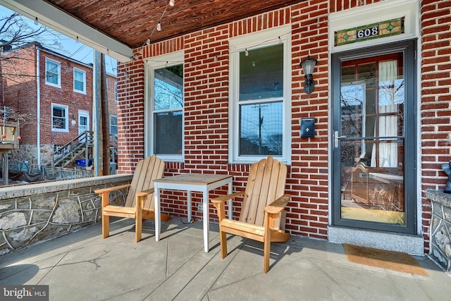 view of patio featuring a porch