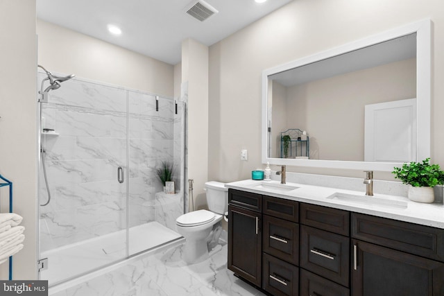 bathroom featuring walk in shower, vanity, and toilet