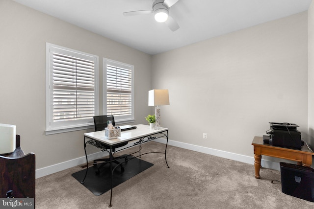 office with light colored carpet and ceiling fan