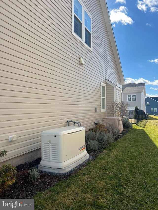 view of home's exterior with a yard