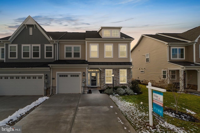 view of front of property featuring a garage