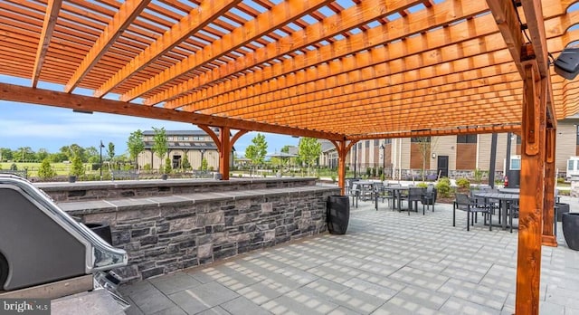 view of patio featuring a pergola