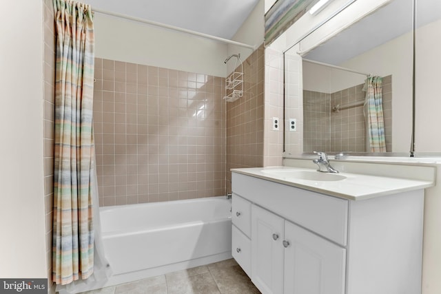 bathroom featuring vanity, tile patterned floors, and shower / bath combo