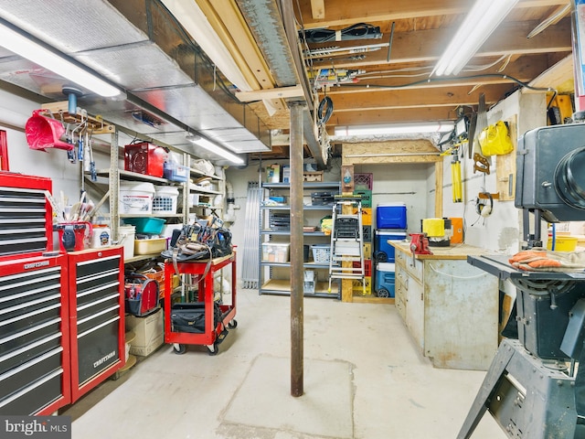 basement with a workshop area