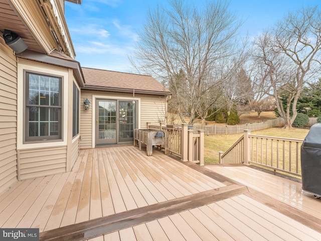 deck featuring a yard