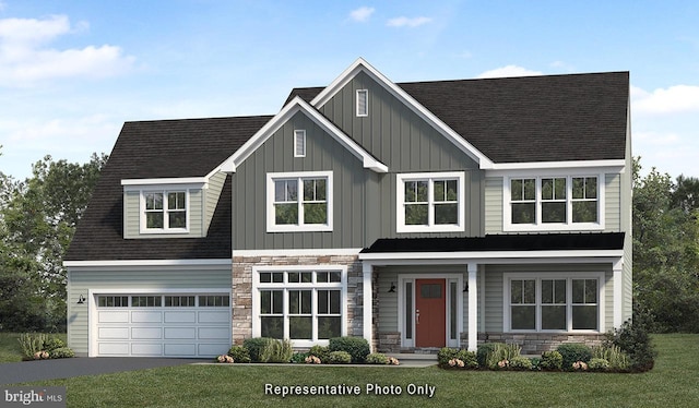 view of front facade featuring a garage and a front lawn