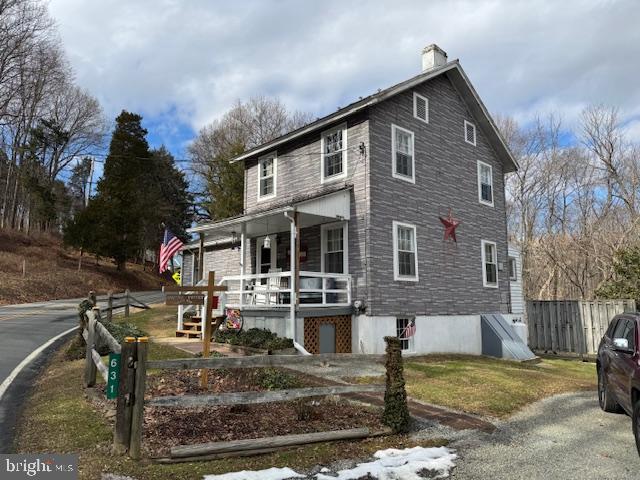 exterior space featuring covered porch