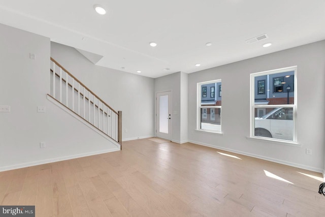 foyer with light hardwood / wood-style flooring