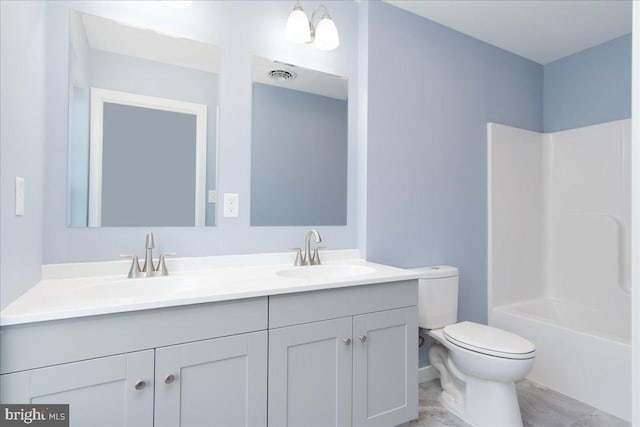 full bathroom featuring vanity, toilet, and bathing tub / shower combination