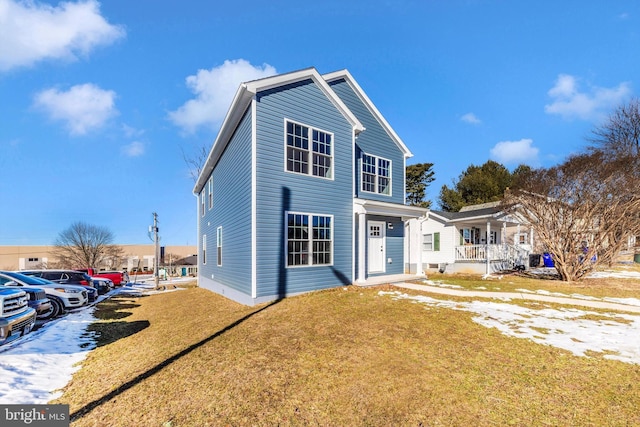 front facade with a front lawn