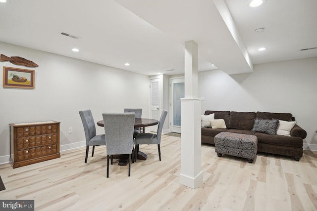 dining room with light hardwood / wood-style floors