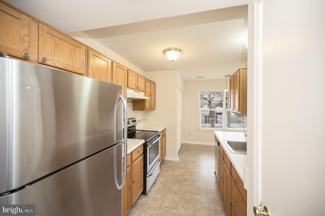 kitchen with tasteful backsplash, stainless steel appliances, and sink