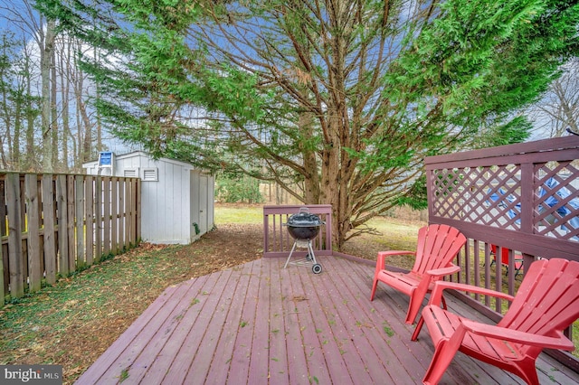 wooden deck featuring a storage shed