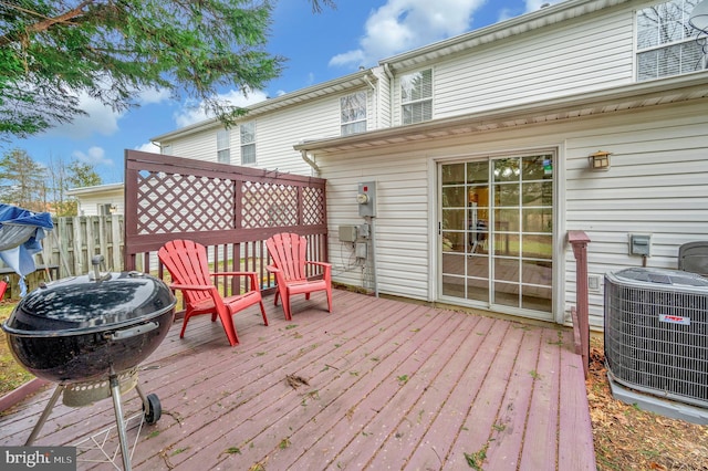 wooden deck with central AC and grilling area