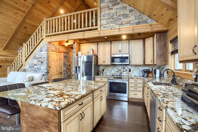 kitchen with a sink, wood ceiling, dark wood-style flooring, and stainless steel appliances