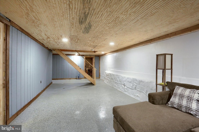 finished basement with wooden ceiling