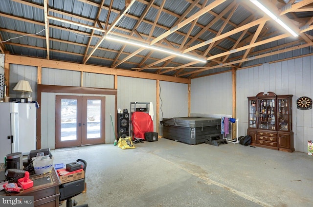 garage featuring french doors and metal wall