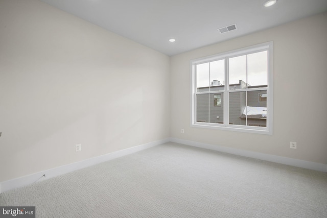 view of carpeted spare room