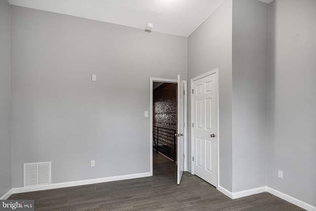 interior space with dark wood-type flooring