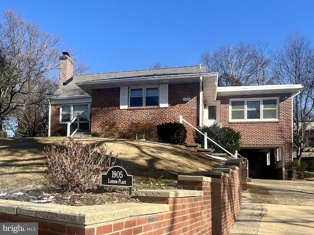 view of front of house with a carport