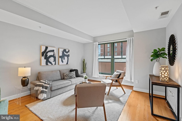 living room with hardwood / wood-style flooring