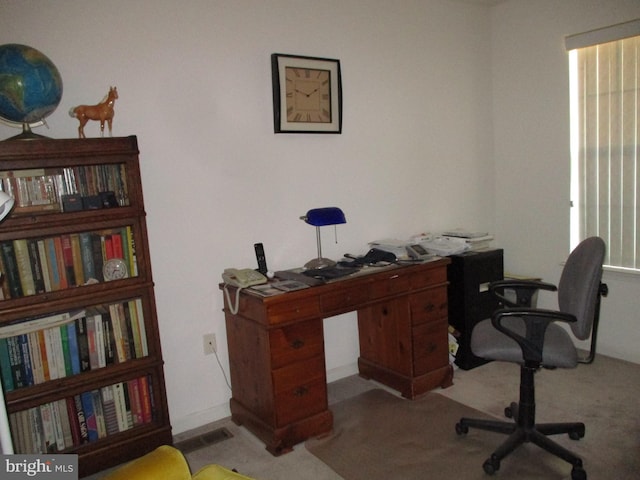 view of carpeted office space