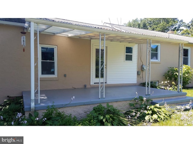 back of house featuring a patio