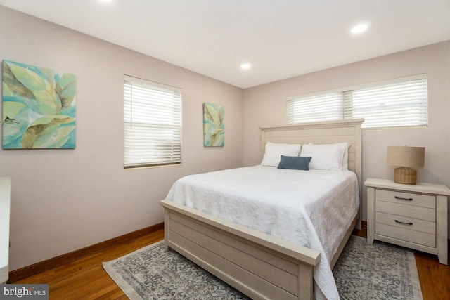 bedroom featuring dark hardwood / wood-style floors