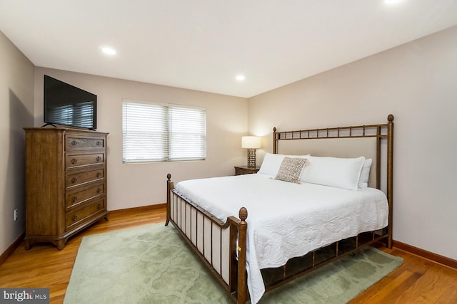 bedroom featuring light wood-type flooring