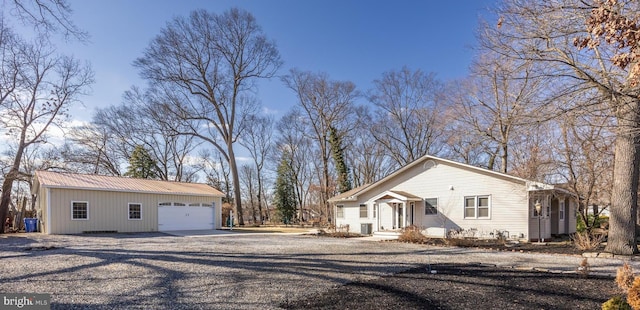 view of side of property with a garage