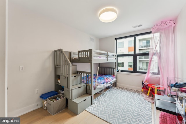 bedroom featuring wood-type flooring