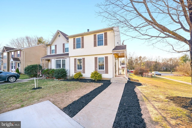 view of front of house with a front lawn