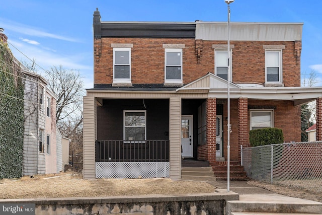 view of property with covered porch