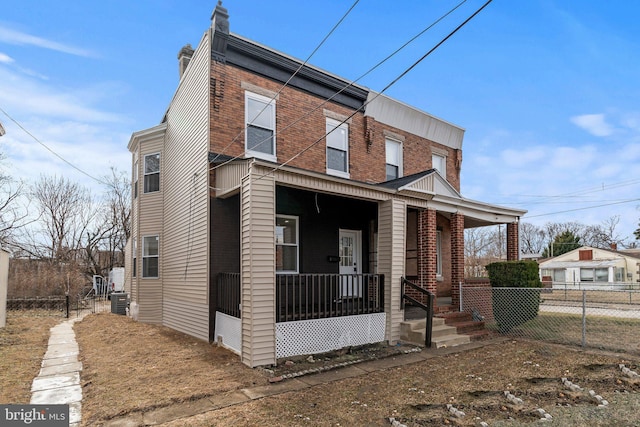 view of front of property featuring covered porch