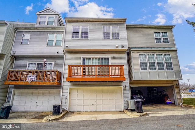 rear view of property featuring central AC unit