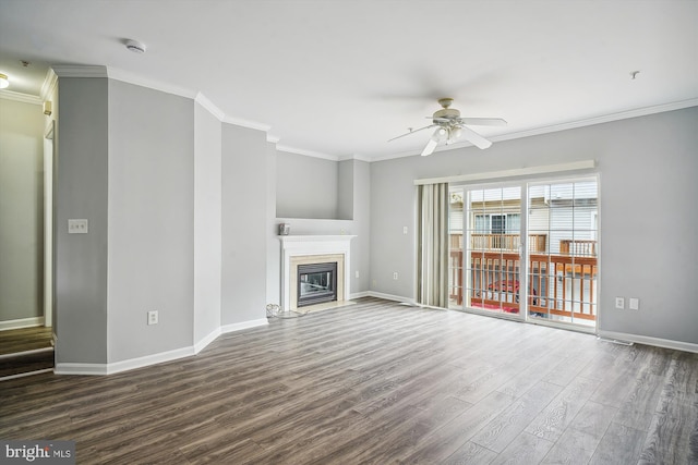 unfurnished living room featuring ceiling fan, ornamental molding, and dark hardwood / wood-style floors