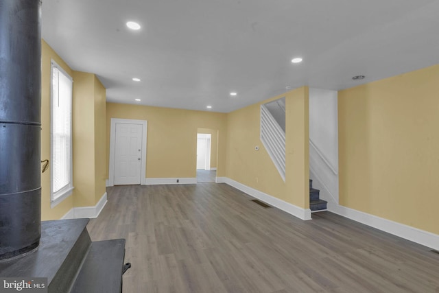 unfurnished living room with hardwood / wood-style floors