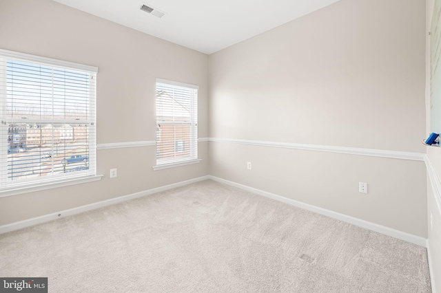 view of carpeted spare room