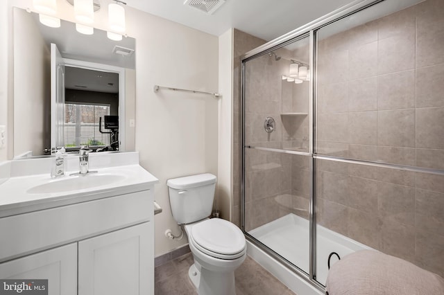 bathroom with walk in shower, tile patterned floors, vanity, and toilet